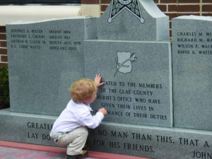 Boy in front of Memorial