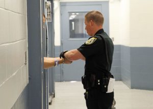 Sheriff interacting with inmate
