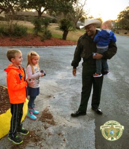 Officer talking with kids