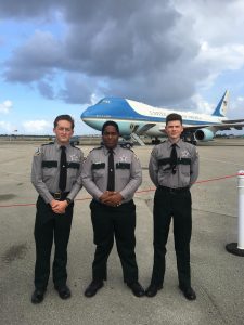 Members of the CCSO Explorer program stand in front of Air Force One.