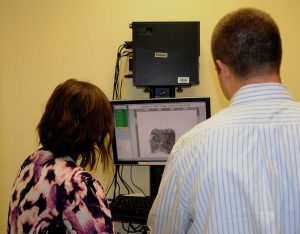 people using finger print scanner